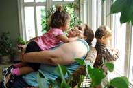 Maria Barroso, 23, with Kristyna, 2, and Matthew, 1, at home in Queens, N.Y. When she first got pregnant, Barroso was toldthat "many plus-size women can't have a baby naturally." She wound up with a cesarean she thinks could have been avoided.